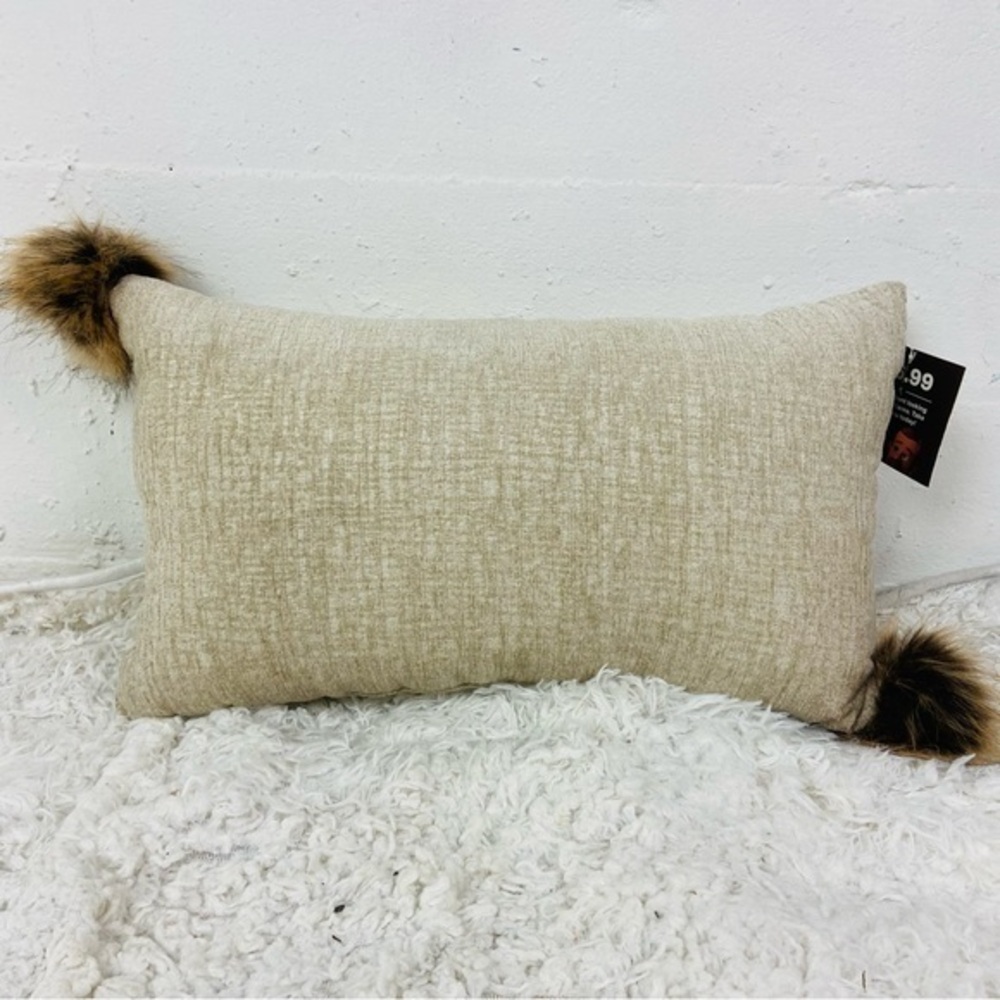 NWT Bob’s furniture Beige Rectangular Pillow with Faux Fur poms Accents